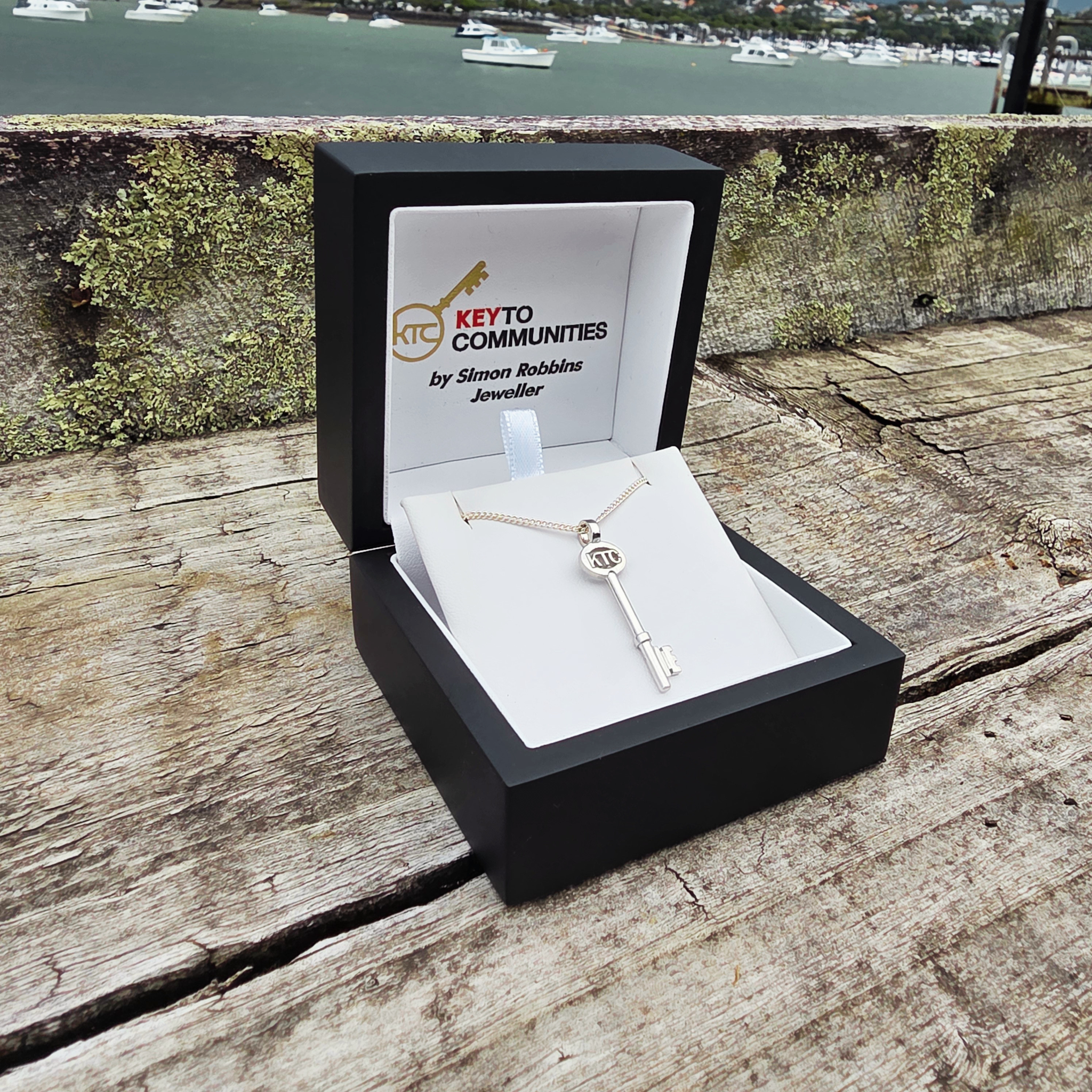 Key to Communities - Platinum Pendant