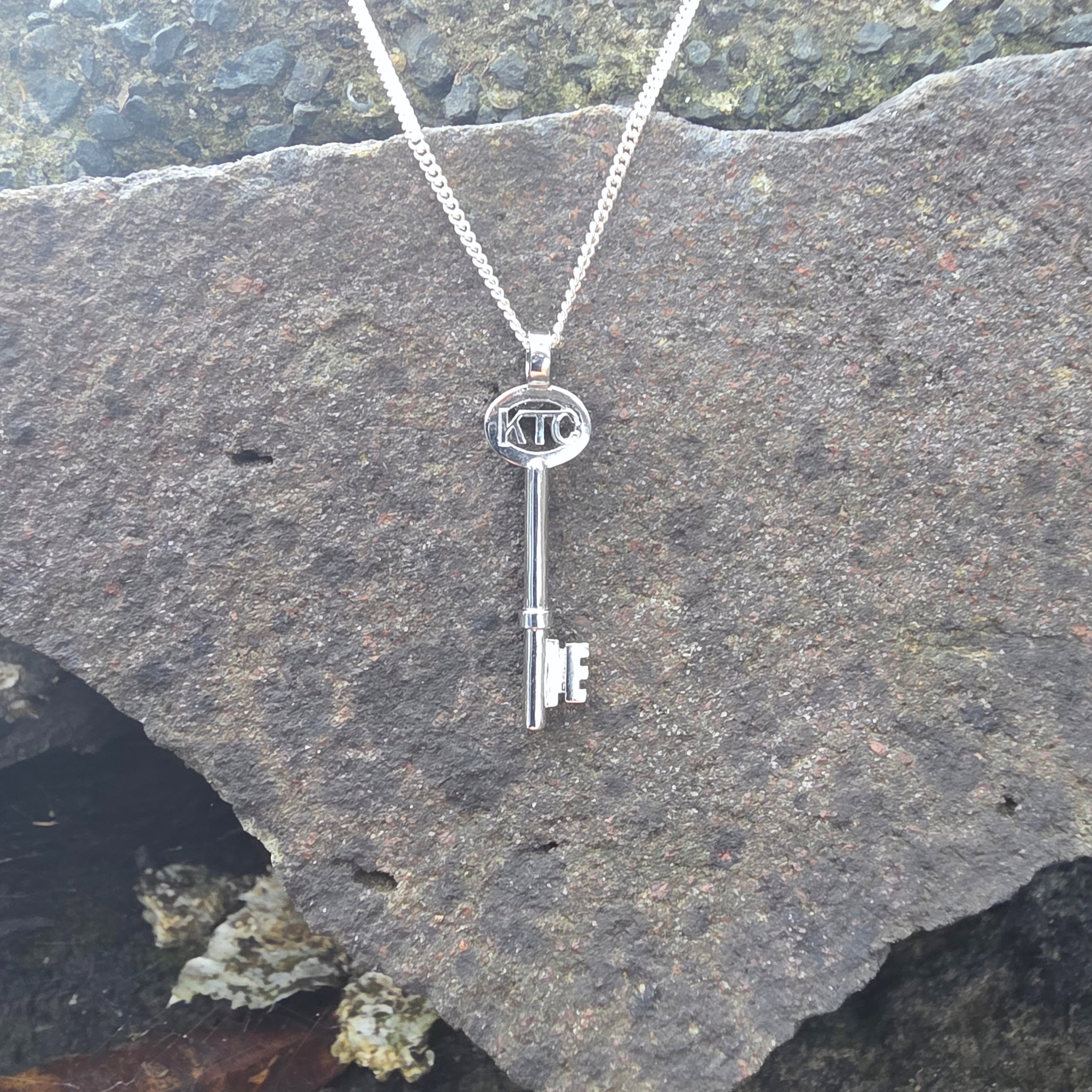 Key to Communities - Platinum Pendant